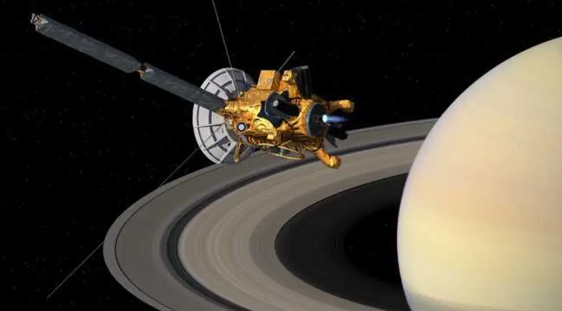 Космічне шоу: станція Cassini відзняла супутник Сатурна, який «диригує» його кільцями (ФОТО) фото 1