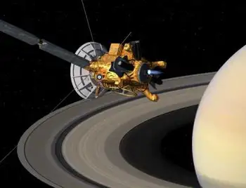 Космічне шоу: станція Cassini відзняла супутник Сатурна, який «диригує» його кільцями (ФОТО) фото 1