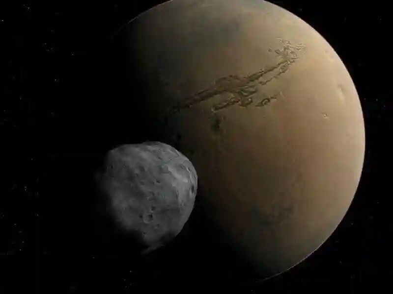 Вчені NASA б’ються над загадкою таємничого моноліту на супутнику Марса Фобосі (ФОТО) фото 1